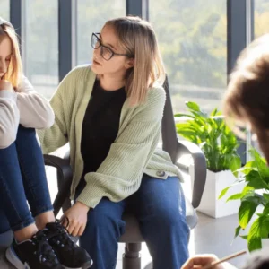 Children and young people's mental health course learner talking with a teenager