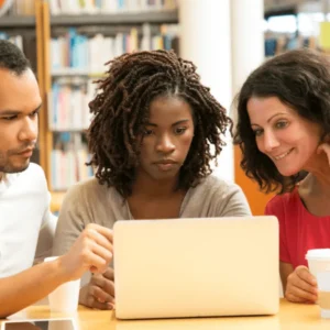 Learning support assistant helping a student in class – Level 2 Award in Support Work in Schools and Colleges